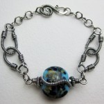 Sterling Silver and Artisan Lampwork Horseshoe Bracelet